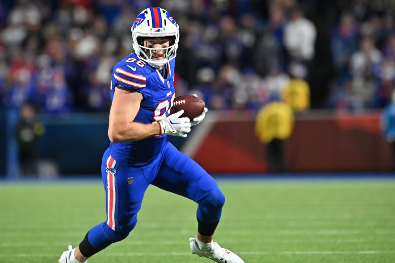 It’s National Tight End Day, but will the Buffalo Bills’ tight end be able to participate in the festivities? Kincaid continues to nurse an oblique issue that sidelined him heading into the bye week.
Now coming out of it, the Bills are motivated to avoid a three-game losing streak. Whether or not Kincaid will be there to help remains to be seen, since his status is coming down to the wire.
Kincaid remains the key to unlocking the receiving game in the tight end room and adds another dimension to the Bills’ increasingly stoppable offense. Getting him back would go a long way in starting to solve those problems.
Here’s the latest on Kincaid before Week 8.
<a></a> Is Dalton Kincaid playing today?
Kincaid is officially active for the Bills in Week 8 against the Carolina Panthers.
He profiled as a true game-time decision, with clarity on Kincaid’s status finally coming when inactive reports were due 90 minutes prior to kickoff.
The tight end has been battling an oblique issue, which sidelined him for the Bills’ last game before their bye week. Kincaid was a surprise inactive for that ‘Monday Night Football’ contest after logging three limited practice sessions.
It remains the case after three limited practices before Week 8, though it is notable that Kincaid was able to shed the non-contact jersey in advance of Buffalo’s trip to Carolina.
Bills TE depth chart
Dalton Kincaid
Dawson Knox
Jackson Hawes
Kincaid is the clear top receiving option out of Buffalo’s tight end room. The volume hasn’t always been there for the third-year tight end, but he has three touchdowns in five games and continues to make his presence felt.
Knox and Hawes play more of the secondary role since neither of them are considered receiving threats. In other words, without Kincaid, Buffalo would just turn the lights off on their tight ends in the passing attack.
This post appeared first on USA TODAY Is Dalton Kincaid playing today?